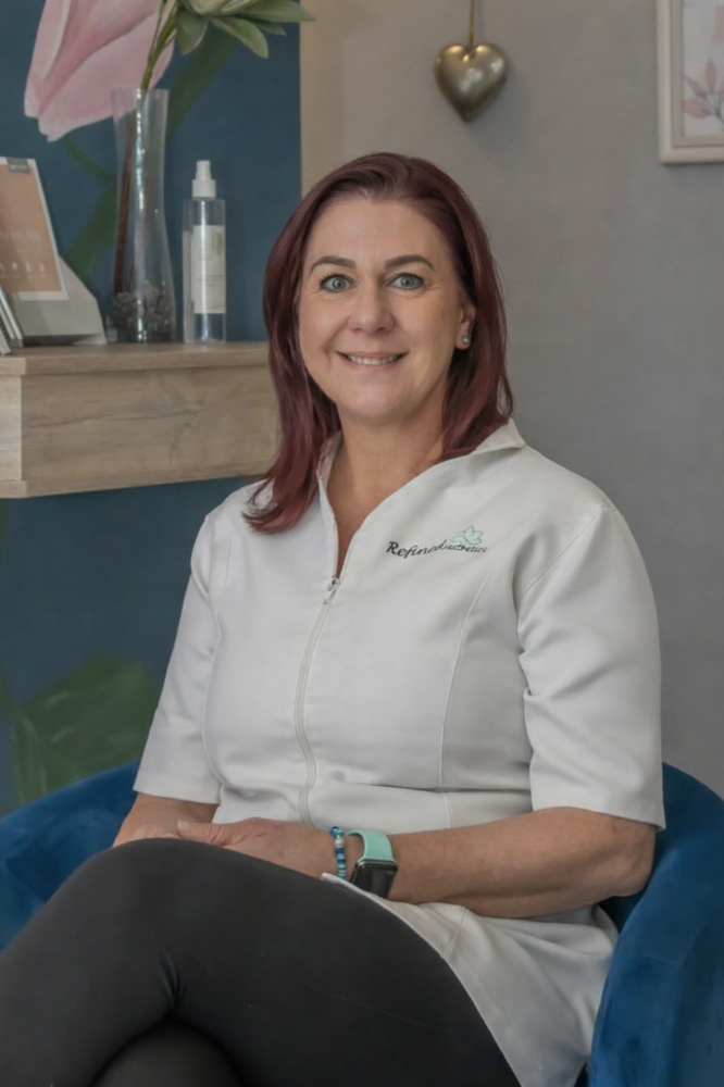 Candice Skincare Specialist and Owner of Refined Aesthetics Aesthetic Clinic in Springs Gauteng Candice, owner and skincare specialist at Refined Aesthetics aesthetic skin clinic in Springs Gauteng, seated inside the professional clinic environment.
